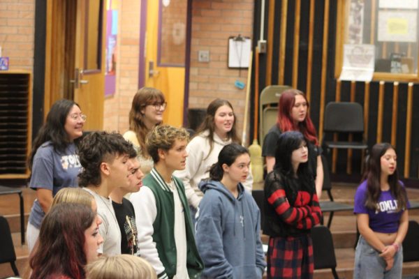Choir rehearses a piece